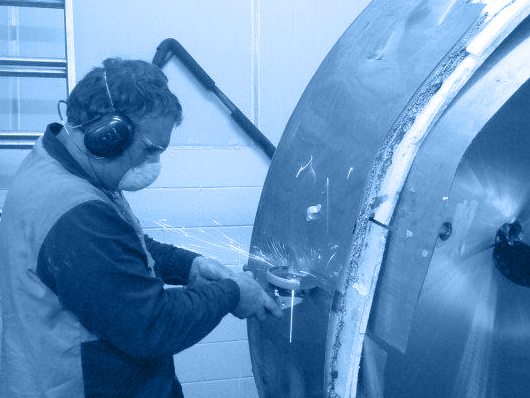 MES Staff Member Martin removing a Tank.